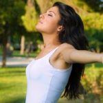 Woman smiling in sunshine