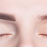 Female eyebrows before and after modeling, coloring, makeup