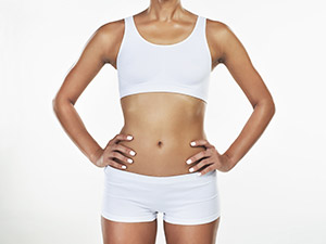 body of woman in studio with weightloss for fitness