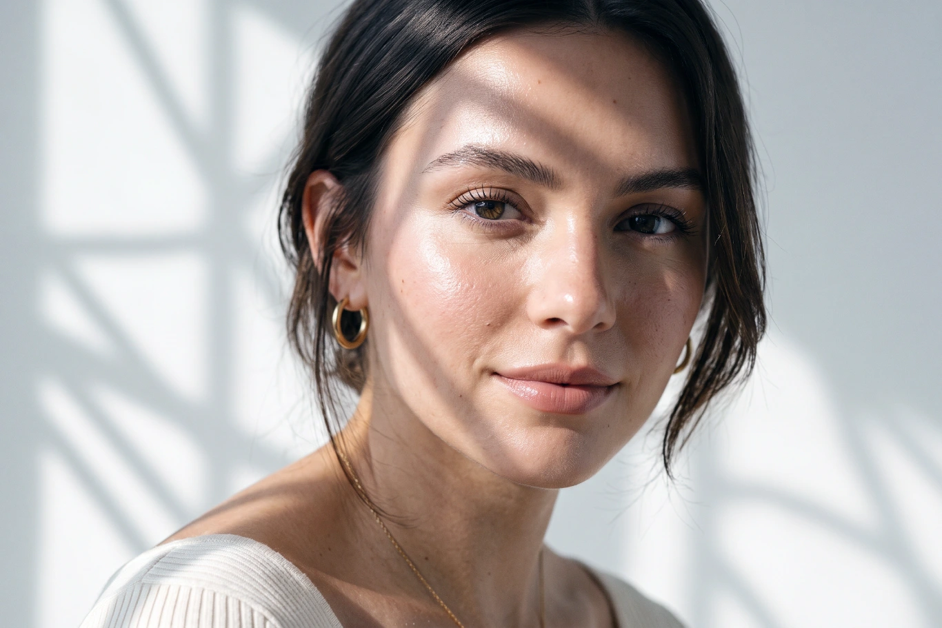 Woman Fresh Glowing Skin Natural Woman With Clear Skin And Gold Hoop Earrings In Soft Natural Light